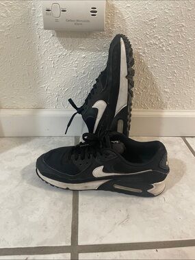 Women's Black and White Athletic Sneakers by Nike